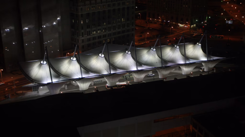 Nighttime view of canopies at the Rosa Parks Transit Center in Detroit, Michigan.