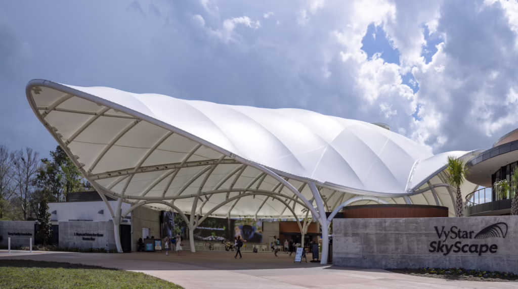 Daytime view of the VyStar SkyScape covered entrance and walkway at the Jacksonville Zoo.