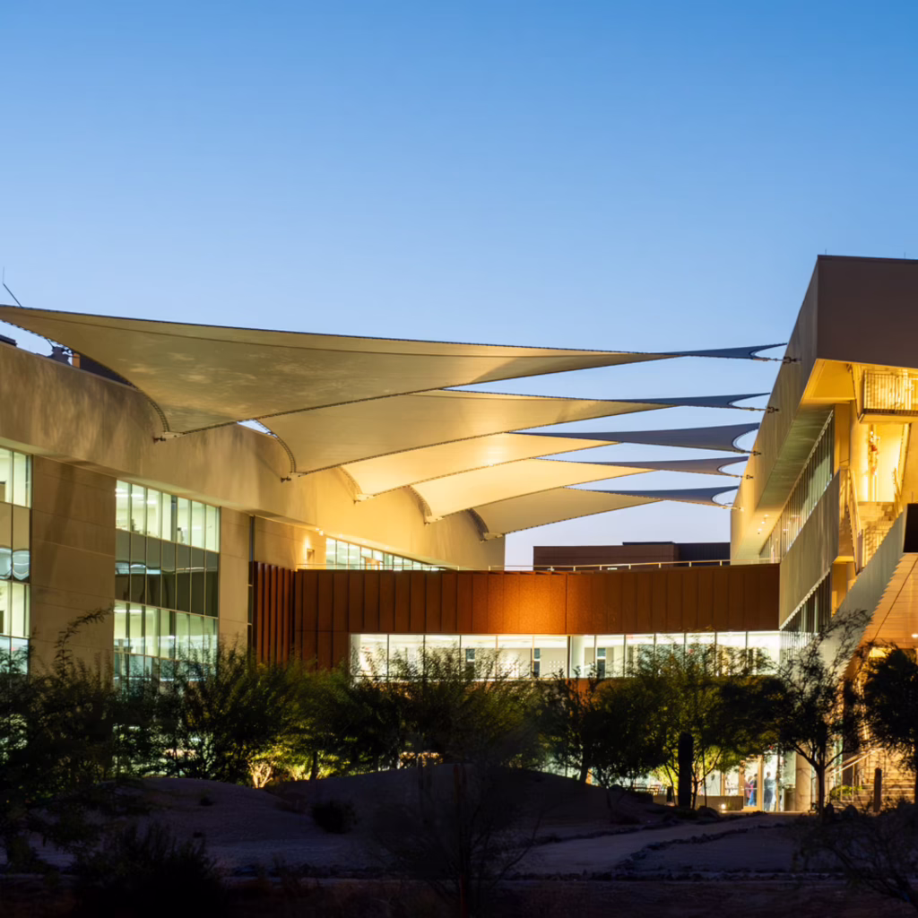 Nighttime view of the canopies at Mayo Clini’s Integrated Education & Research Building in Phoenix, Arizona.